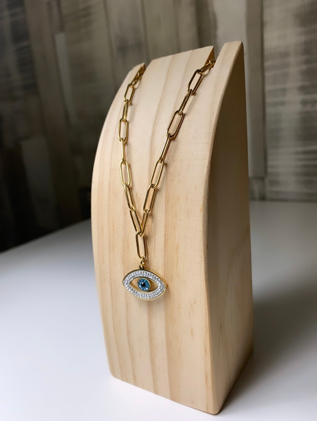 Collier œil bleu avec strass & chaîne doré