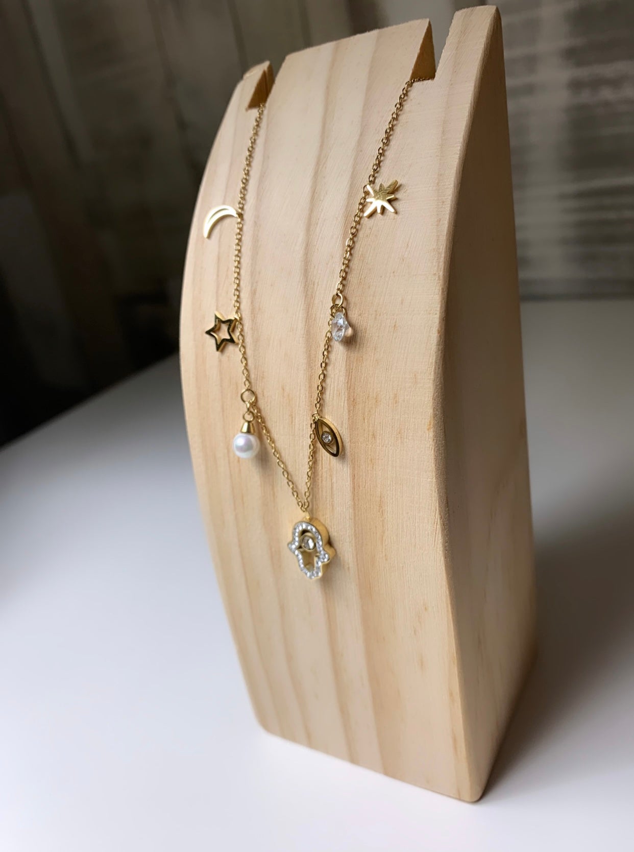 Collier main de fatma avec plusieurs motifs