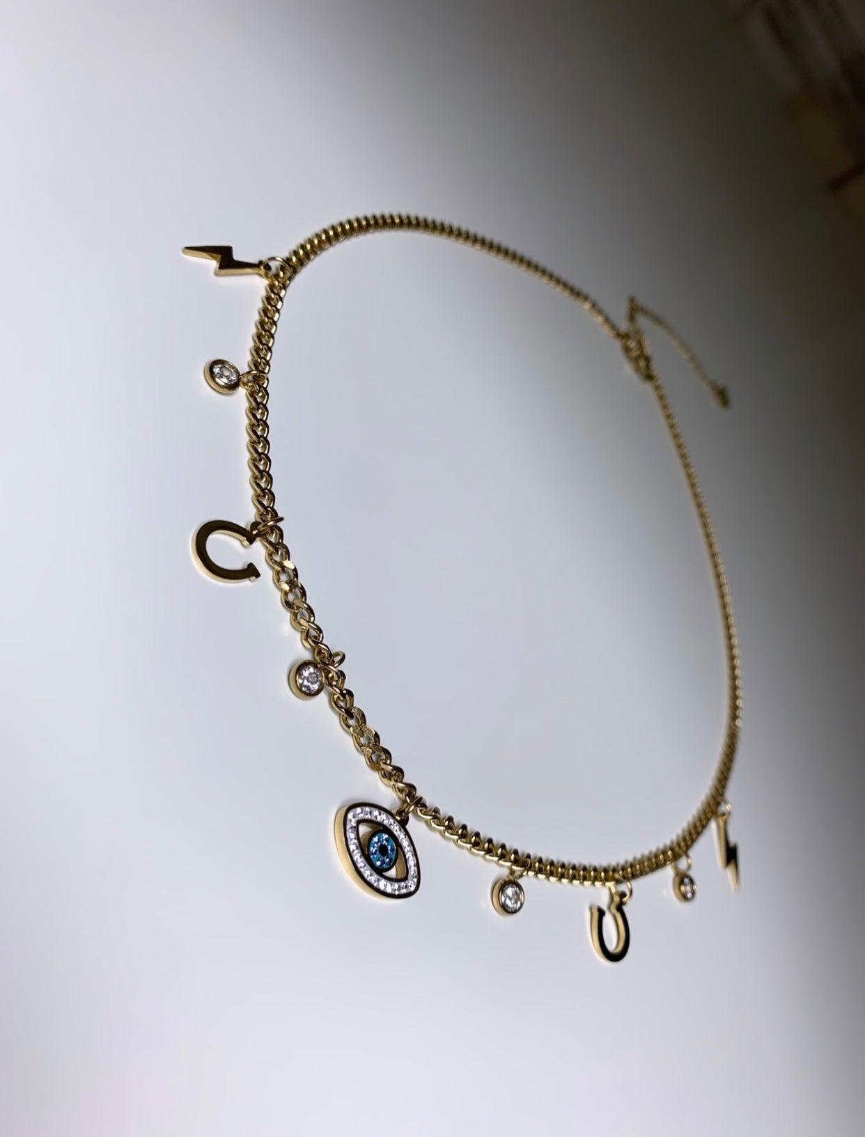 Collier plusieurs pendentifs œil bleu