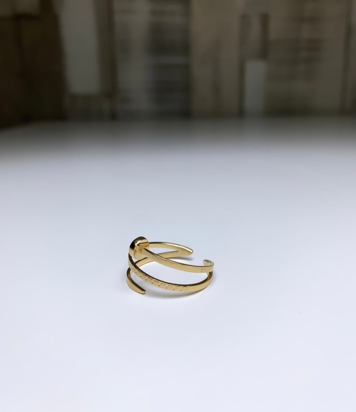 Bague clou doré
