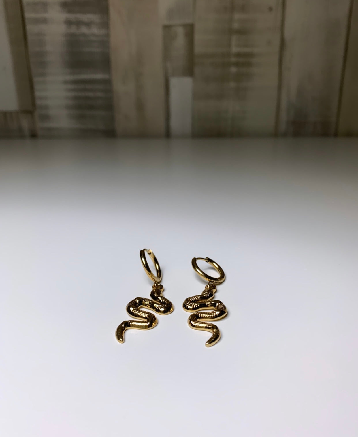 Boucles d’oreilles serpent doré