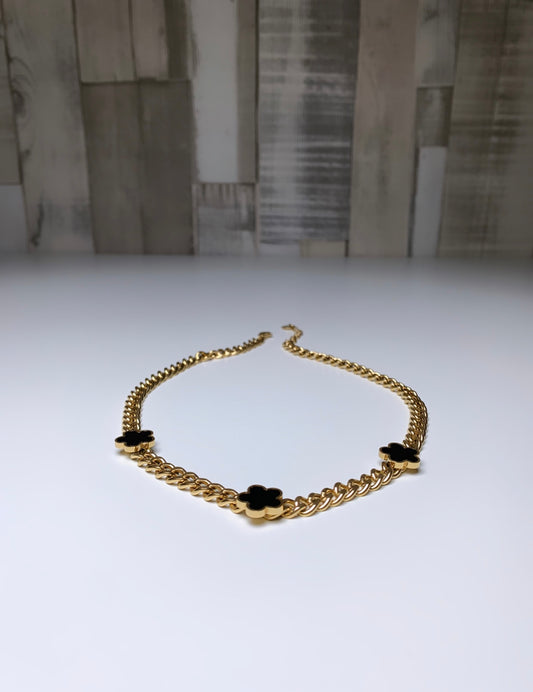 Collier doré trèfles noir